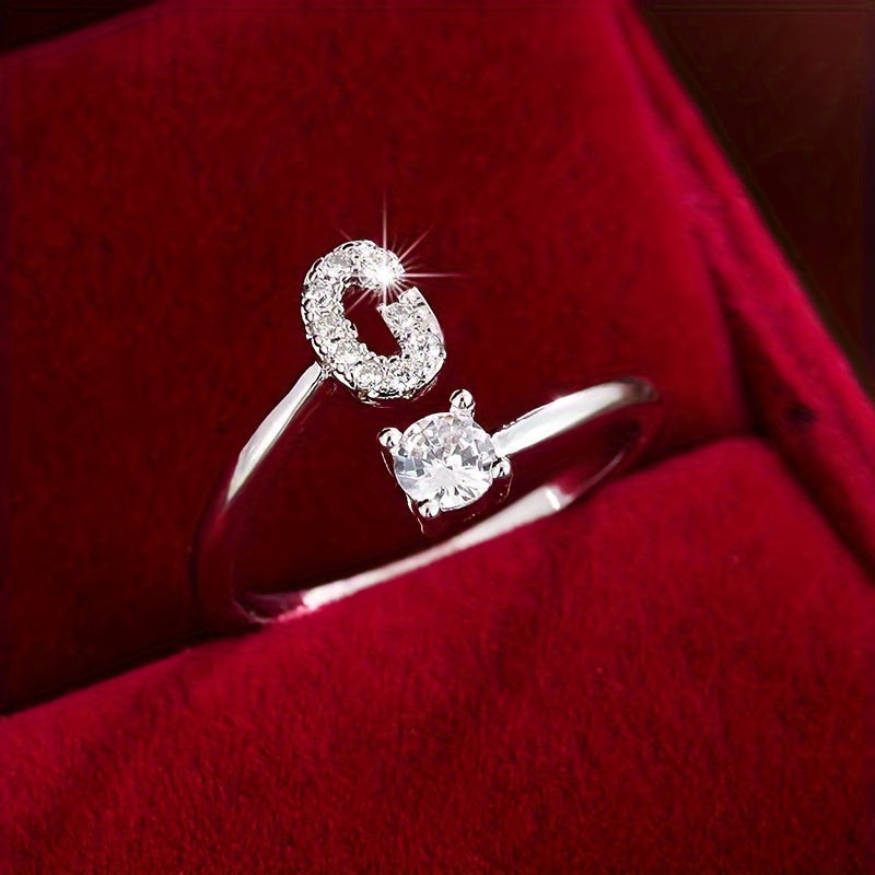 Adjustable Copper Ring With Four-claw Round Zirconia, Featuring The 26 English Letters Of Fashion Trend.