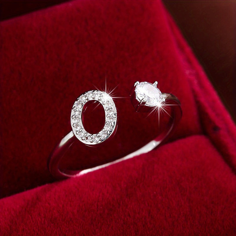 Adjustable Copper Ring With Four-claw Round Zirconia, Featuring The 26 English Letters Of Fashion Trend.