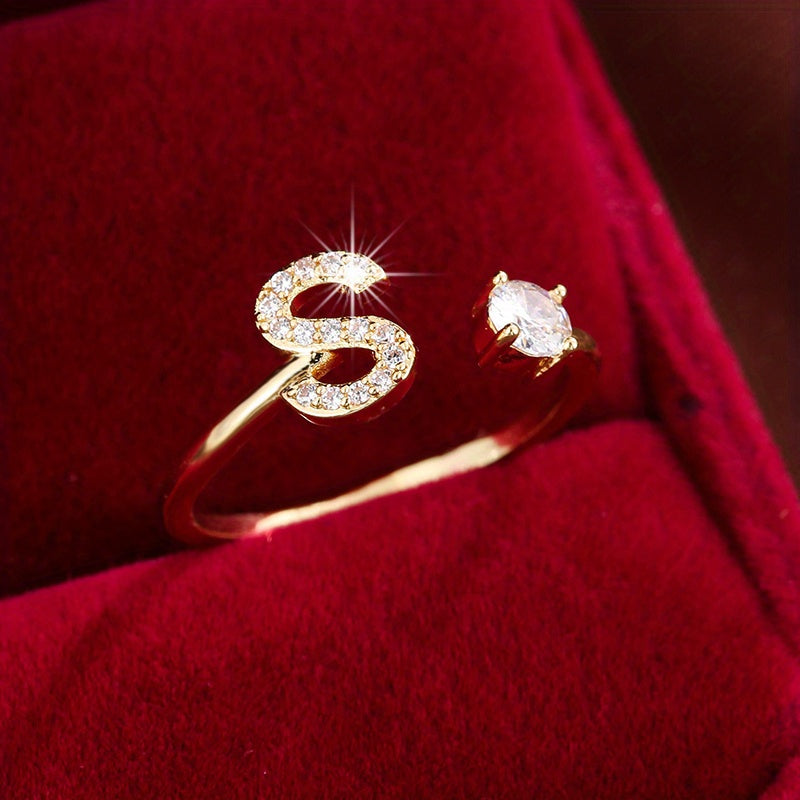 Adjustable Copper Ring With Four-claw Round Zirconia, Featuring The 26 English Letters Of Fashion Trend.