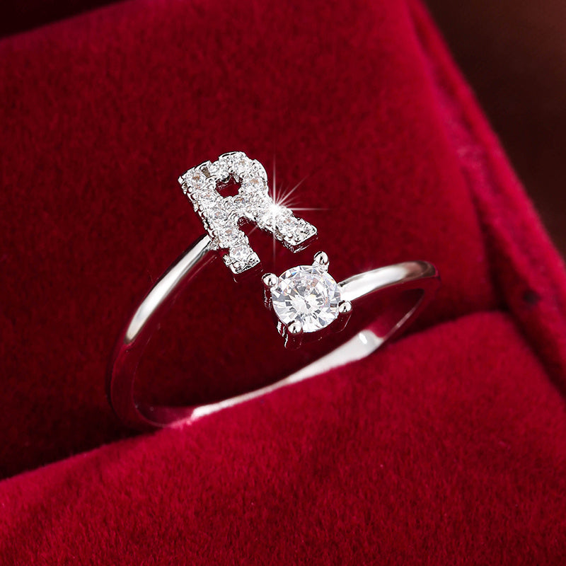 Adjustable Copper Ring With Four-claw Round Zirconia, Featuring The 26 English Letters Of Fashion Trend.
